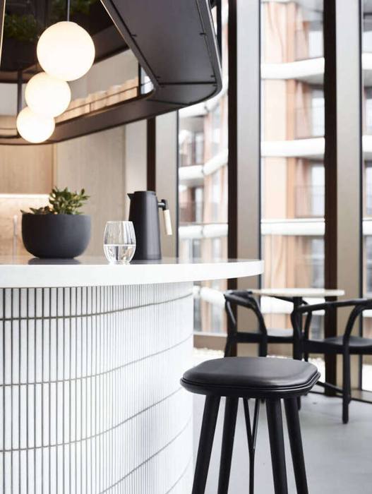 Fluted tile bar with globe pendants