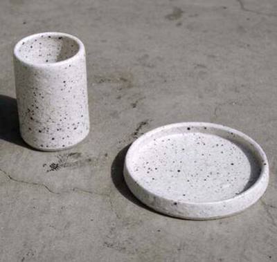 ReCinder speckled cup and plate by Rosy Napper, made with recycled ash